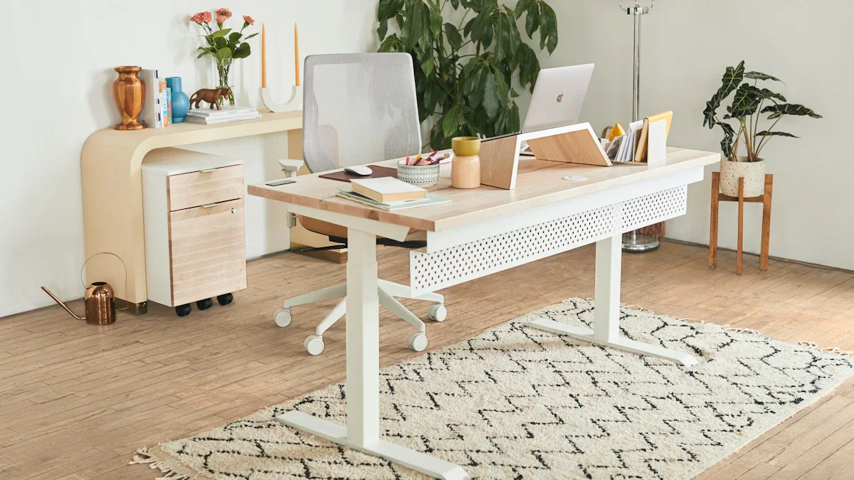 Laptop on a white desk beside plants in a bright office workspace.